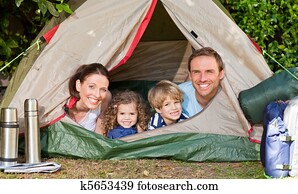 Joyful family camping in the garden Joyful family camping in the garden