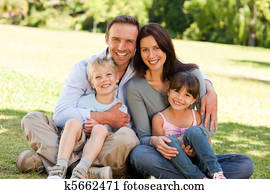 Family sitting in the park