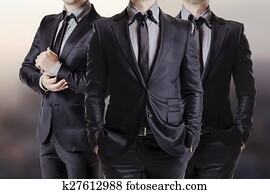 Close up image of three business me