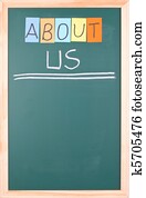 About us, colorful word on blackboard About us, colorful word on blackboard