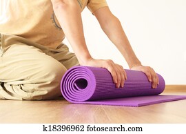 man with yoga mat man with yoga mat