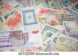 Background from banknotes of various monetary currencies