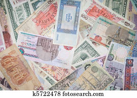 Background from banknotes of various monetary currencies