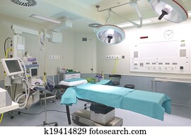 Surgery room with bed and machinery. Surgery room with bed and machinery.