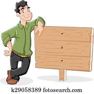 Young man and wood billboard Young man and wood billboard