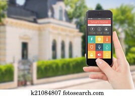 Directly front view of a smartphone with smart home application 