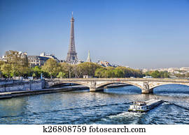 Eiffel Tower with boat on Seine in Paris, France Eiffel Tower with boat on Seine in Paris, France
