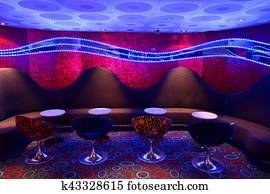 Bar tables and bar stools in natural light