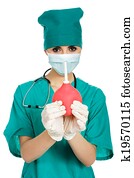 doctor with an enema syringe