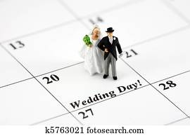 Concept: Bride and groom on calendar