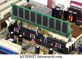 Concept: Construction Workers installing computer memory