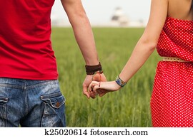 Holding hands couple Holding hands couple