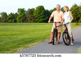 senior couple cycling senior couple cycling