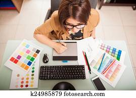 Graphic designer in her office Graphic designer in her office