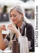 woman alone in a cafe