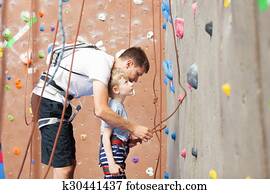 boy rock climbing boy rock climbing