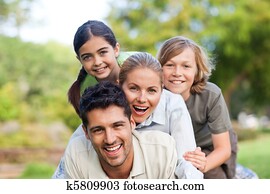 Happy family in the park Happy family in the park