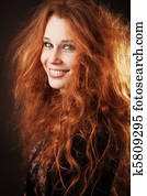 Redhead woman with beautiful long hair
