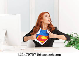 woman shows her superman uniform underneath her clothes. Super businesswoman sitting in office and taking off clothes woman shows her superman uniform underneath her clothes. Super businesswoman sitting in office and taking off clothes