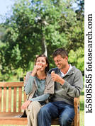 Young couple eating an ice cream
