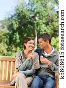 Young couple eating an ice cream