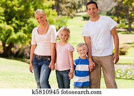 Adorable family in the park Adorable family in the park