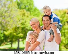 Happy family in the park Happy family in the park