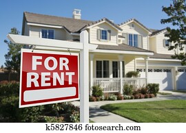 For Rent Real Estate Sign in Front of House