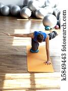 fitness - man practicing pilates fitness - man practicing pilates