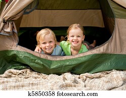 Happy family camping in the park Happy family camping in the park
