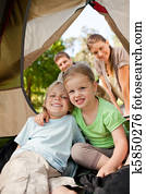 Happy family camping in the park Happy family camping in the park
