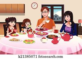 Family having a tea party together Family having a tea party together