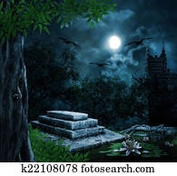Tombstone in celebration of Halloween on the background of the m Tombstone in celebration of Halloween on the background of the m