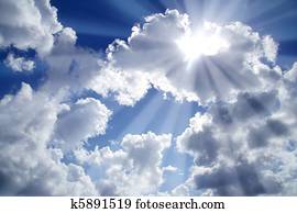 beams of light sky blue with white clouds