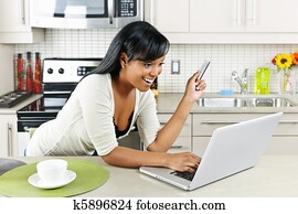 Woman shopping online at home