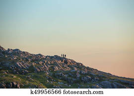 friends on rocky hillside, Fogo Island