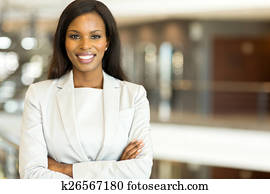 black business executive with arms crossed