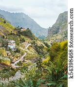 View of dwellings between landscape of vegetation and mountains of the Paul Valley, on the island of Santo Antao, Cape Verde