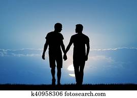 gay couple at sunset gay couple at sunset