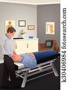 Male Chiropractor Treating a Patient Male Chiropractor Treating a Patient