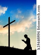 man praying under the cross man praying under the cross