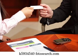 Business man and business woman making a deal Business man and business woman making a deal