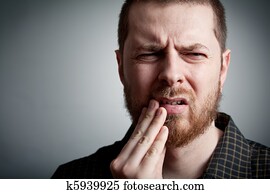 Toothache - man with teeth problems Toothache - man with teeth problems