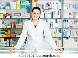 Pharmacy chemist woman in drugstore