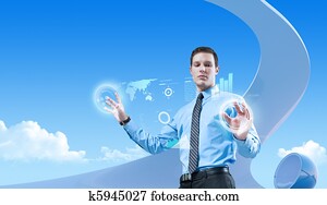 Young handsome businessman using futuristic hologram interface in the bio style interior. Future concepts collection. Young handsome businessman using futuristic hologram interface in the bio style interior. Future concepts collection.