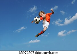 child playing football or soccer child playing football or soccer