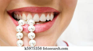 snow-white pearls of teeth snow-white pearls of teeth
