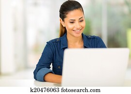 college student using laptop computer