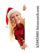 woman with santa hat holding empty board 