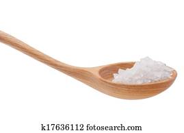 Mineral salt in wooden spoon isolated on white background cutout